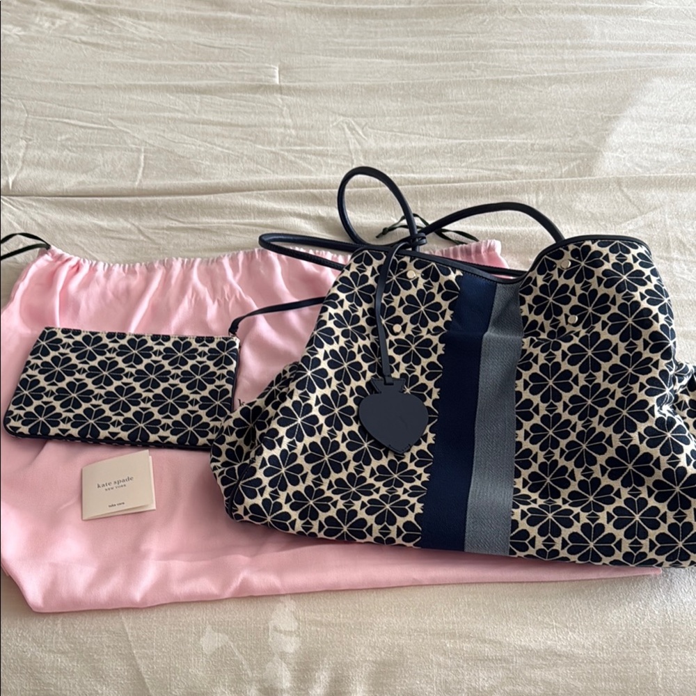 Large navy blue and cream colored Kate Spade tote